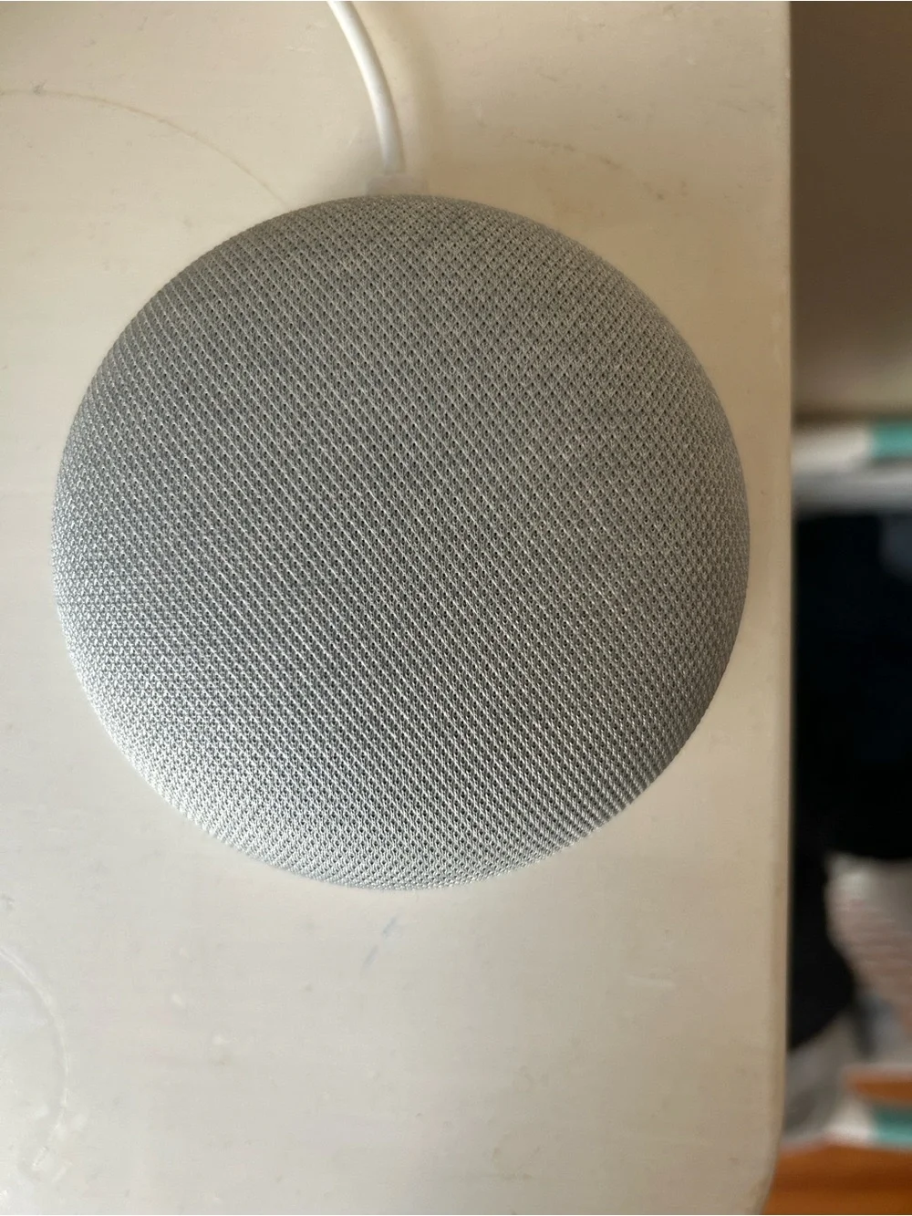 Google Nest Mini Smart Speaker in Light Gray and White
